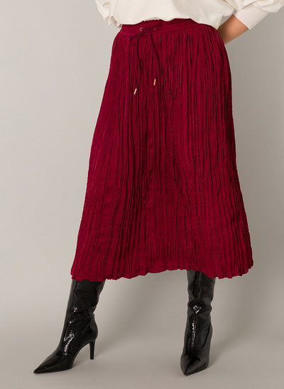 Yest - Farida Pleated Skirt in Dark Red shown on a model