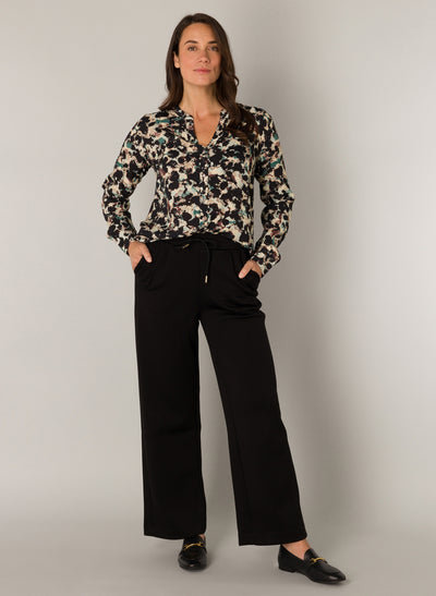 shown on a model the Yest - Nelly Wide Leg Drawstring Trousers in Black