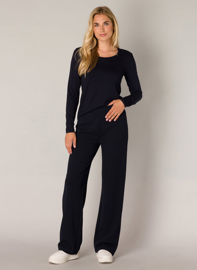 The Yest Base Level Basic Trousers are the perfect blend of smart and comfy. Crafted from soft and cozy fabric, you'll look sharp but feel like a slouch. Perfect for when you need to look professional but still want to keep it chill! In a classic black colour, who can turn down such a perfect.&nbsp; Also available in navy.     Made of 97% recycled polyester, 3% elastic, wash at 30 degree and low iron when needed