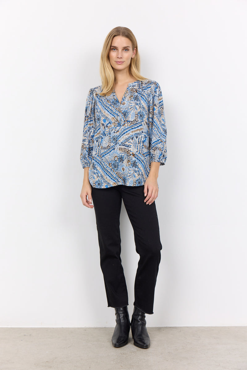 This mid sleeve blouse with v-neck is a great addition to any wardrobe.&nbsp; Perfect with Jeans fro a more casual look or a great staple for a work wardrobe.  Shown here on a model