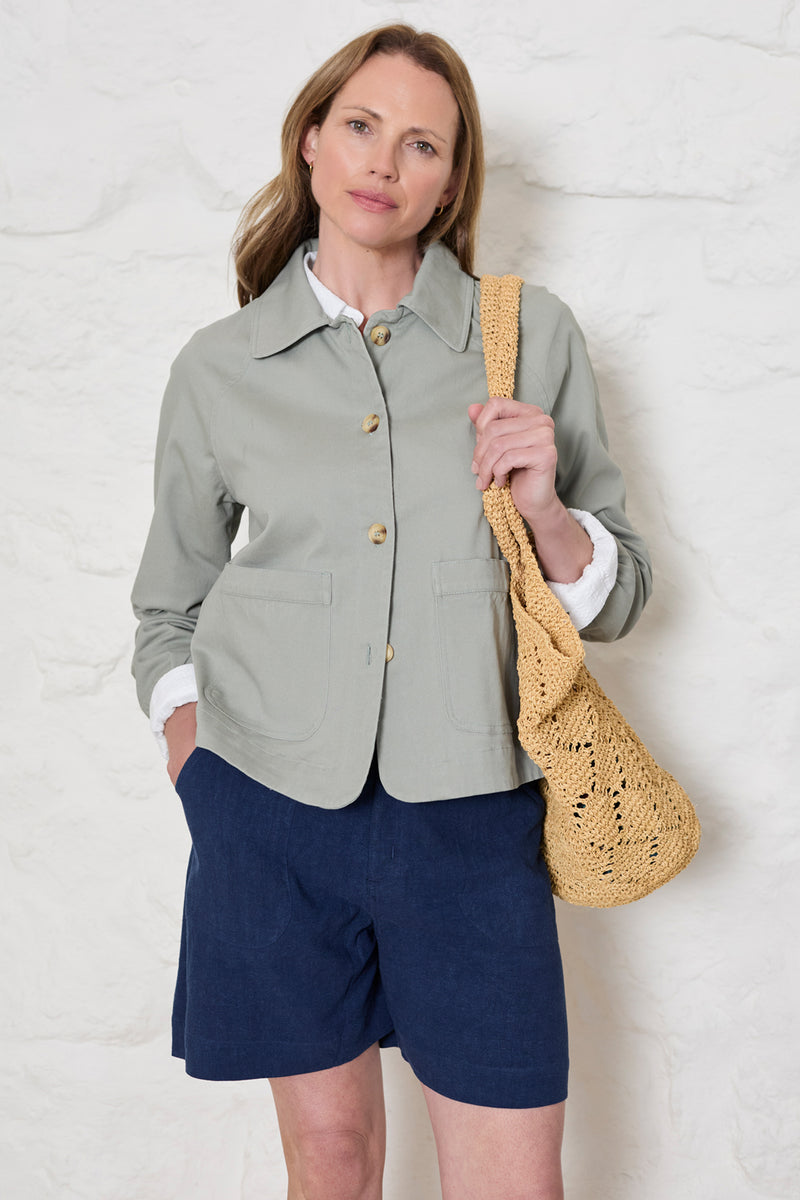 Lily & Me - Kynance Jacket with pockets in Sage Green close up showing it closed