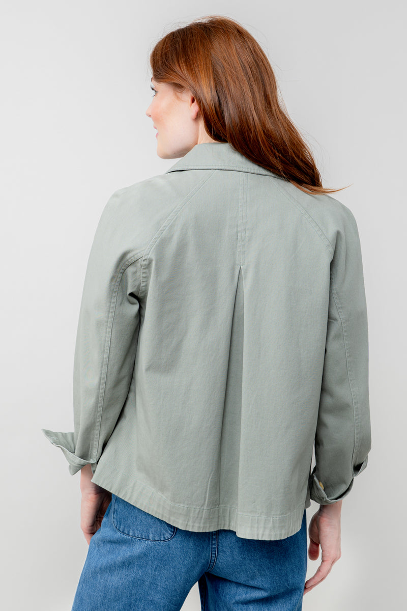 Lily & Me - Kynance Jacket with pockets in Sage Green showing the soft pleat in the back