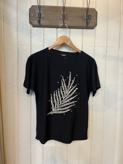 Get comfy and stylish with our Pomodoro - Leaf Design T-Shirt! shown here in Black , this tee features a unique leaf design that's perfect for day or a casual evening out. Show off your fun side with this quirky and playful shirt!